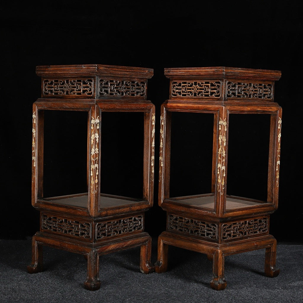 A pair of rosewood flower racks