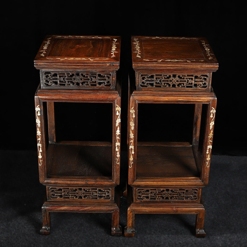 A pair of rosewood flower racks