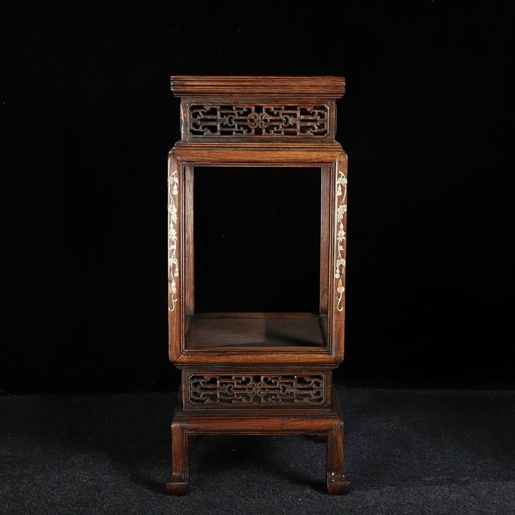 A pair of rosewood flower racks