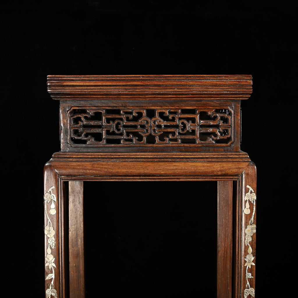 A pair of rosewood flower racks