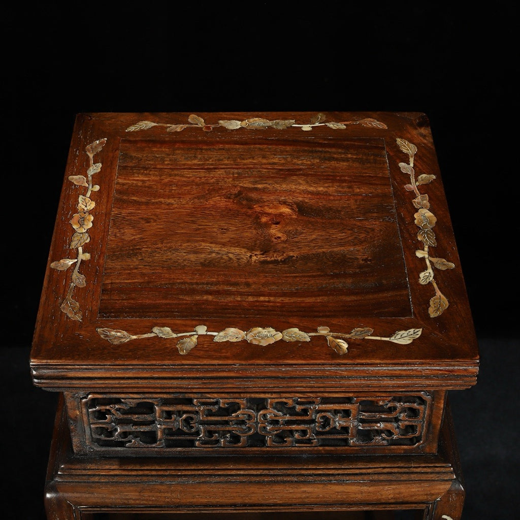 A pair of rosewood flower racks