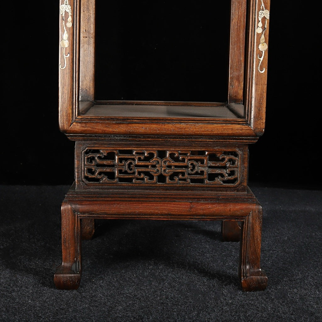 A pair of rosewood flower racks