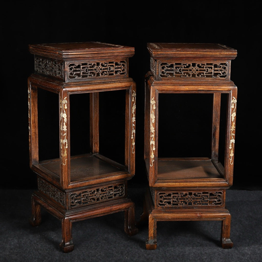 A pair of rosewood flower racks