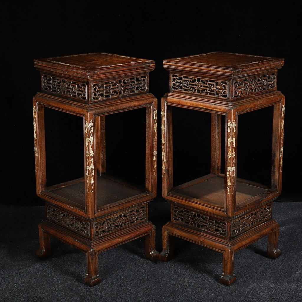 A pair of rosewood flower racks