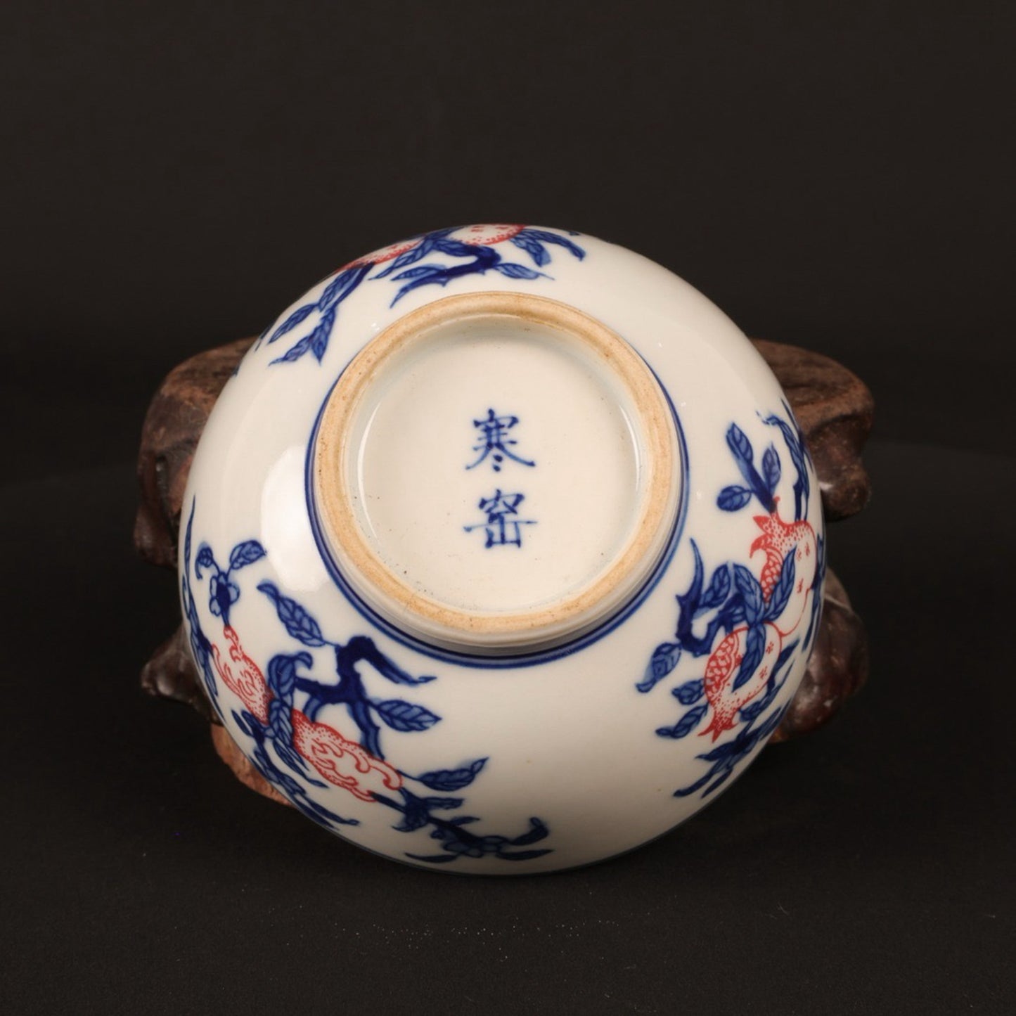 A pair of hand pressure cups with blue and white enamel, red blessings and longevity pictures