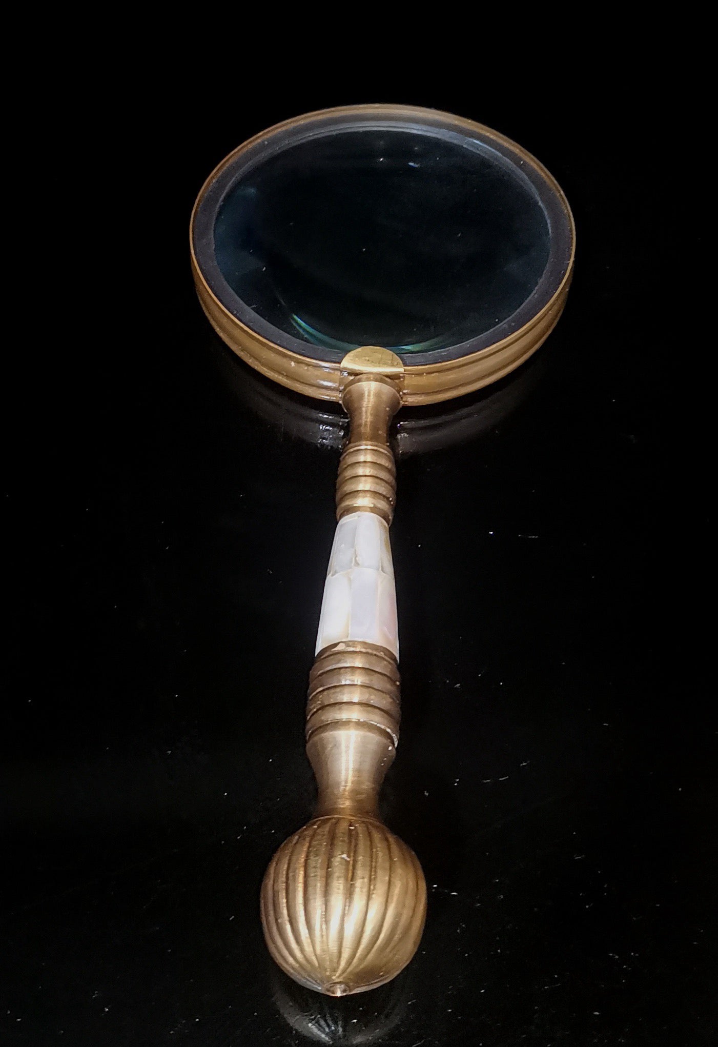 Copper inlaid seashell magnifying glass