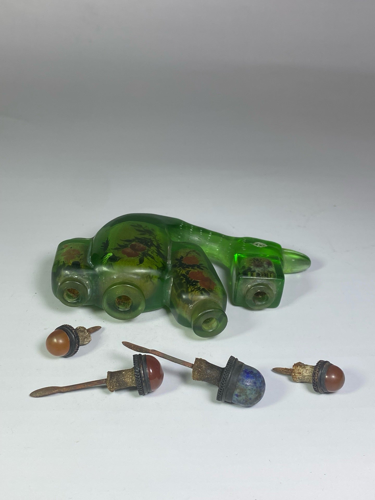 Chinese antique glazed bird shaped four groups of painted snuff bottles