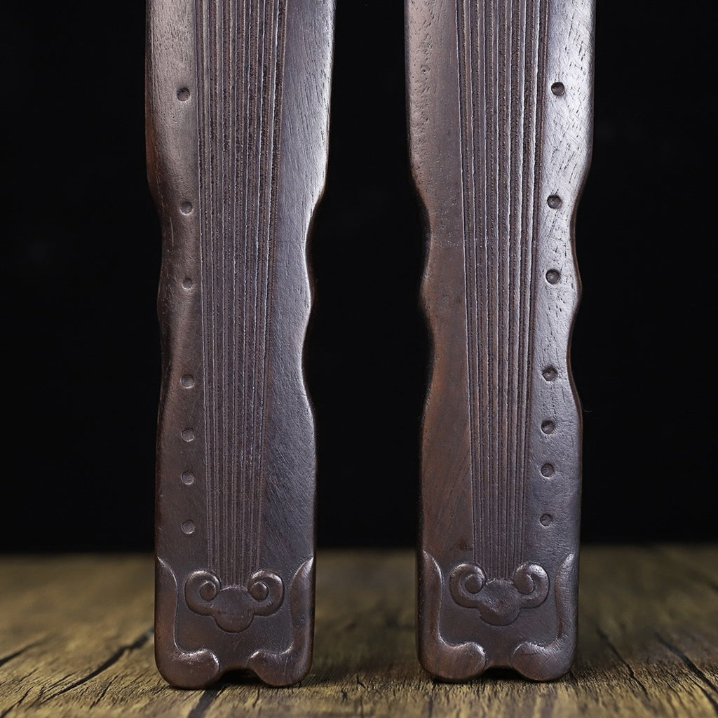 A pair of Huali wood carved Guqin weights and rulers