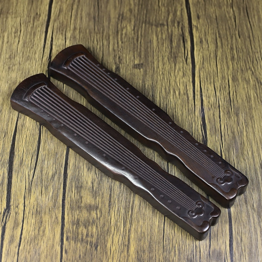 A pair of Huali wood carved Guqin weights and rulers