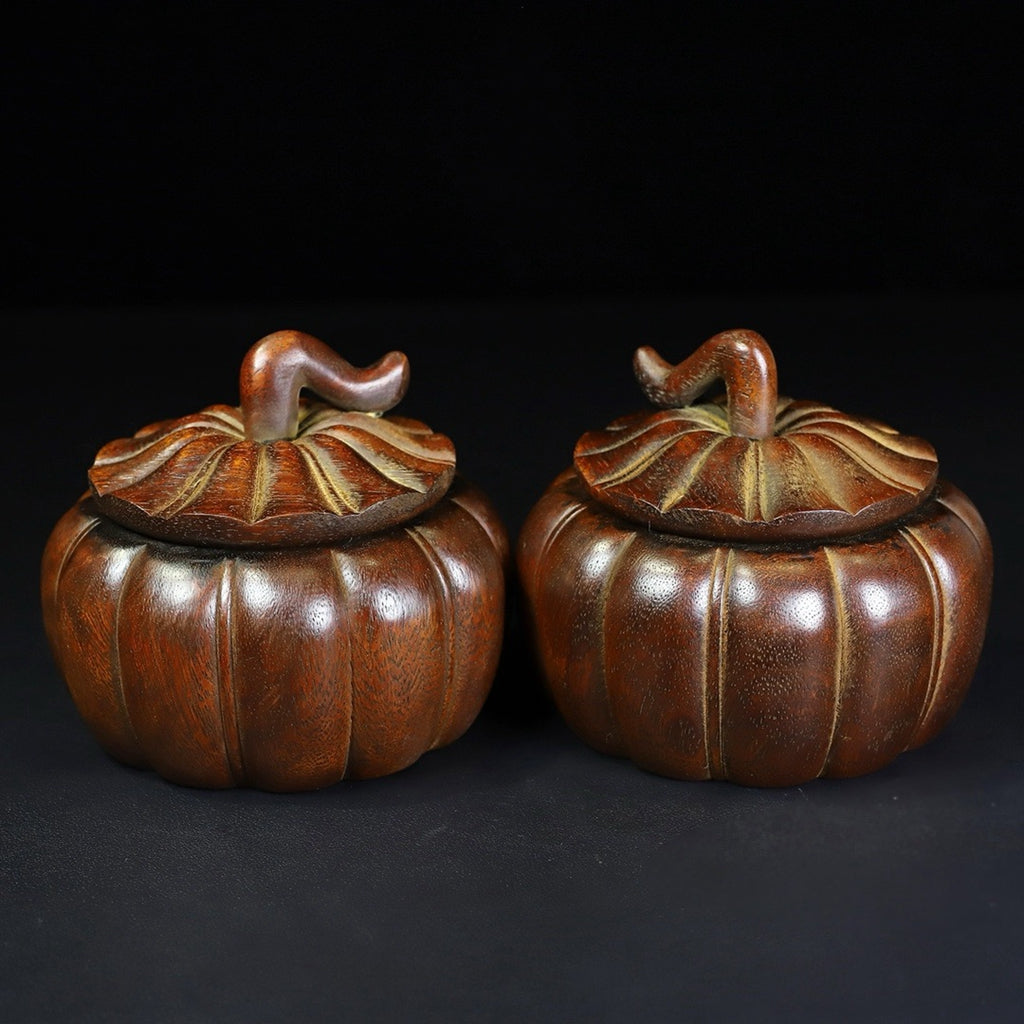 A pair of rosewood Go jars