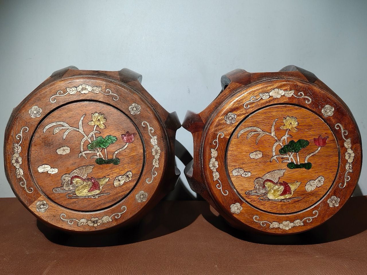 A pair of Chinese antique rosewood colored seashells and drum stools
