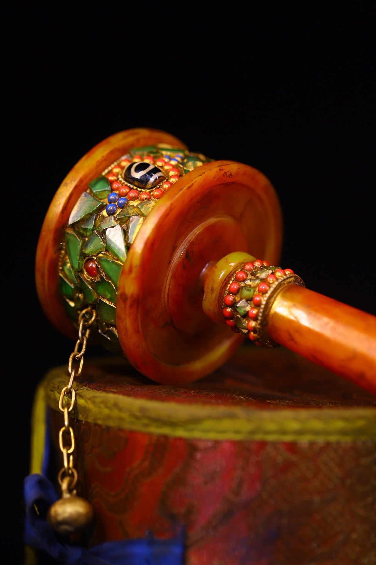 Handmade with flowing honey wax, inlaid with gemstones, the celestial bead spinning wheel