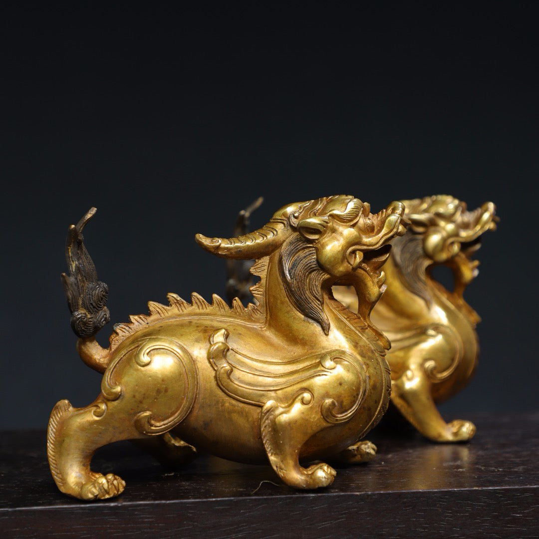 A pair of Chinese antique pure copper qilin ornaments