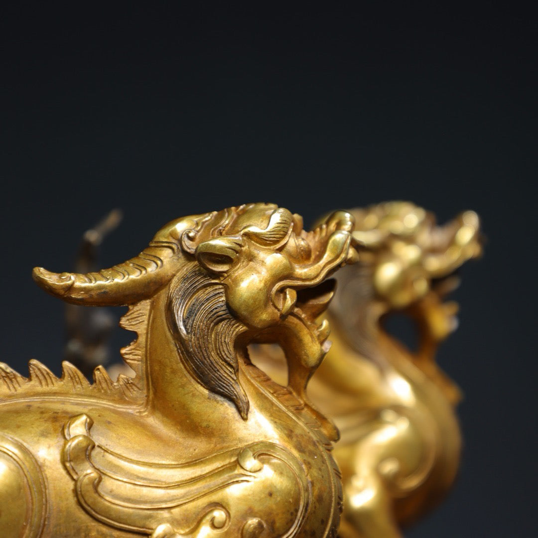 A pair of Chinese antique pure copper qilin ornaments