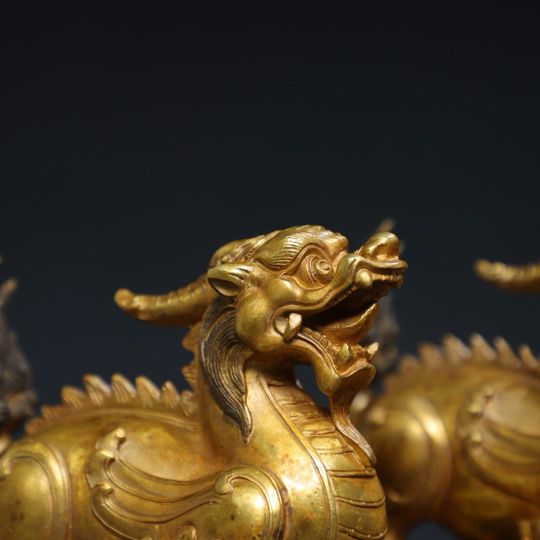 A pair of Chinese antique pure copper qilin ornaments