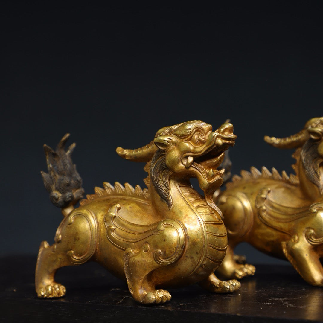 A pair of Chinese antique pure copper qilin ornaments