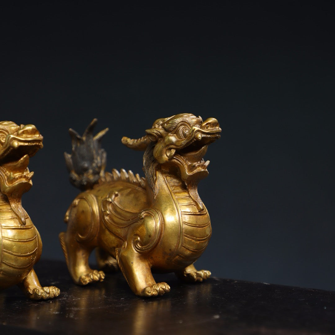 A pair of Chinese antique pure copper qilin ornaments