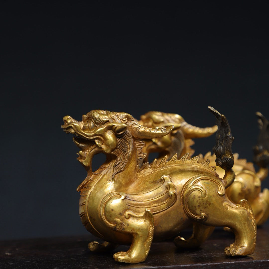 A pair of Chinese antique pure copper qilin ornaments