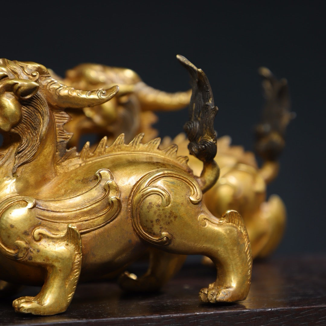 A pair of Chinese antique pure copper qilin ornaments