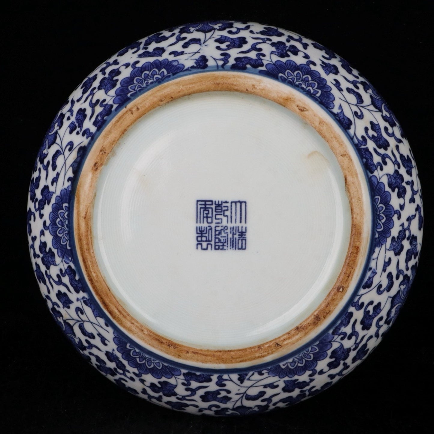 Blue and white entangled branches and lotus patterned tea cake lid jar