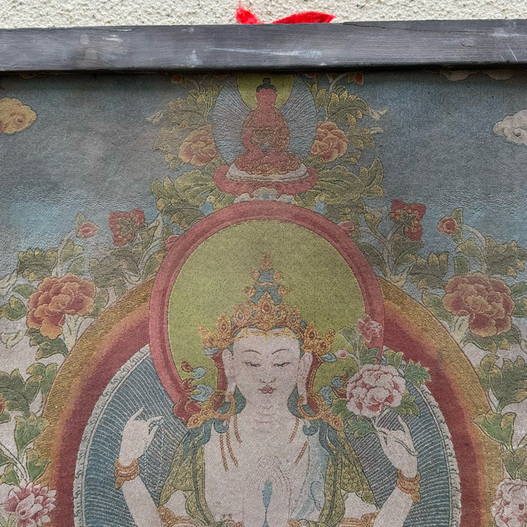 Wooden framed embroidered four armed Guanyin Buddha thangka