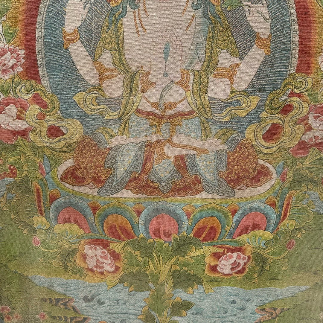 Wooden framed embroidered four armed Guanyin Buddha thangka