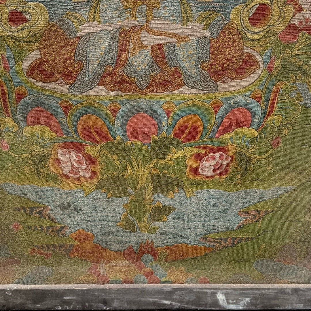 Wooden framed embroidered four armed Guanyin Buddha thangka