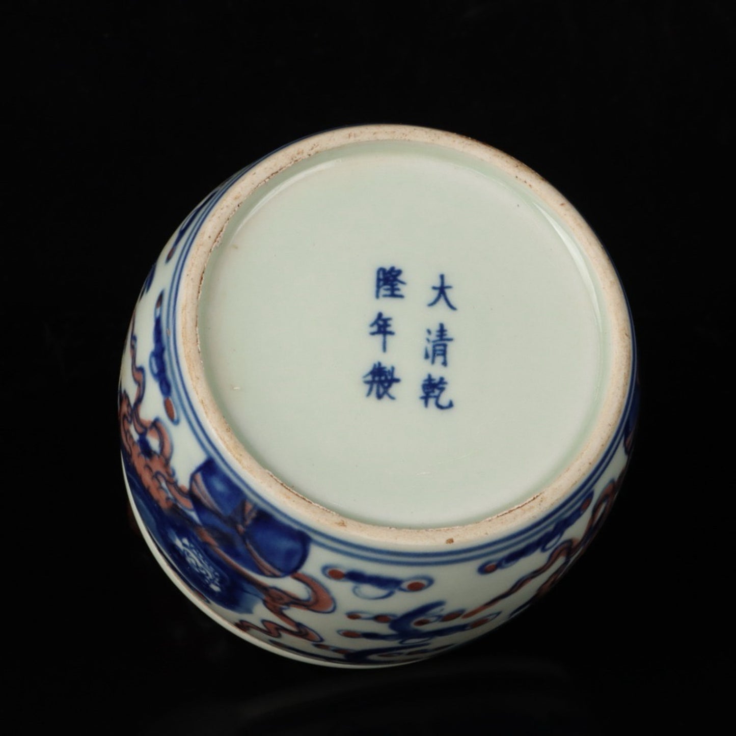 Blue and white glazed red lion rolling embroidered ball pattern cricket jar