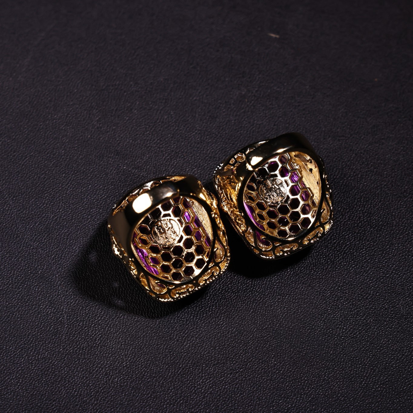 A box of Chinese antique purple gemstone rings