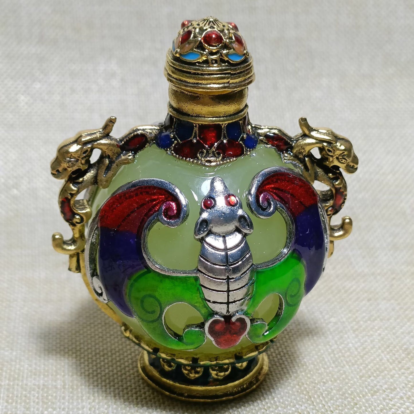 Chinese antique copper inlaid cloisonn é luminous snuff bottle