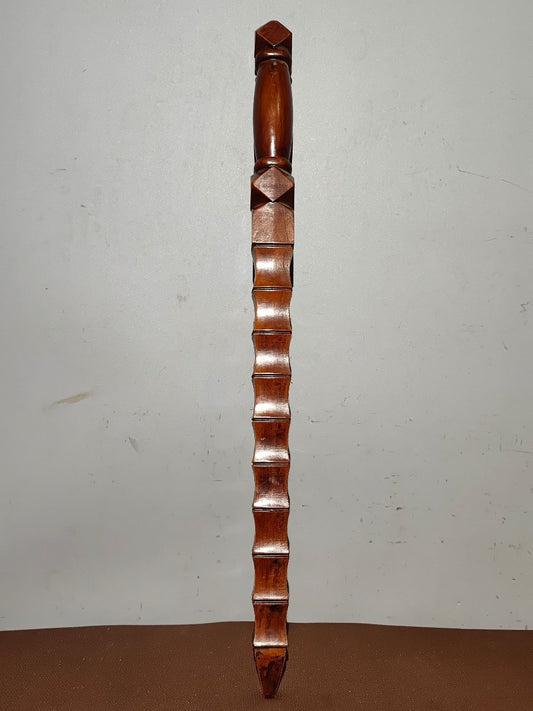 A bamboo whip carved from old peach wood