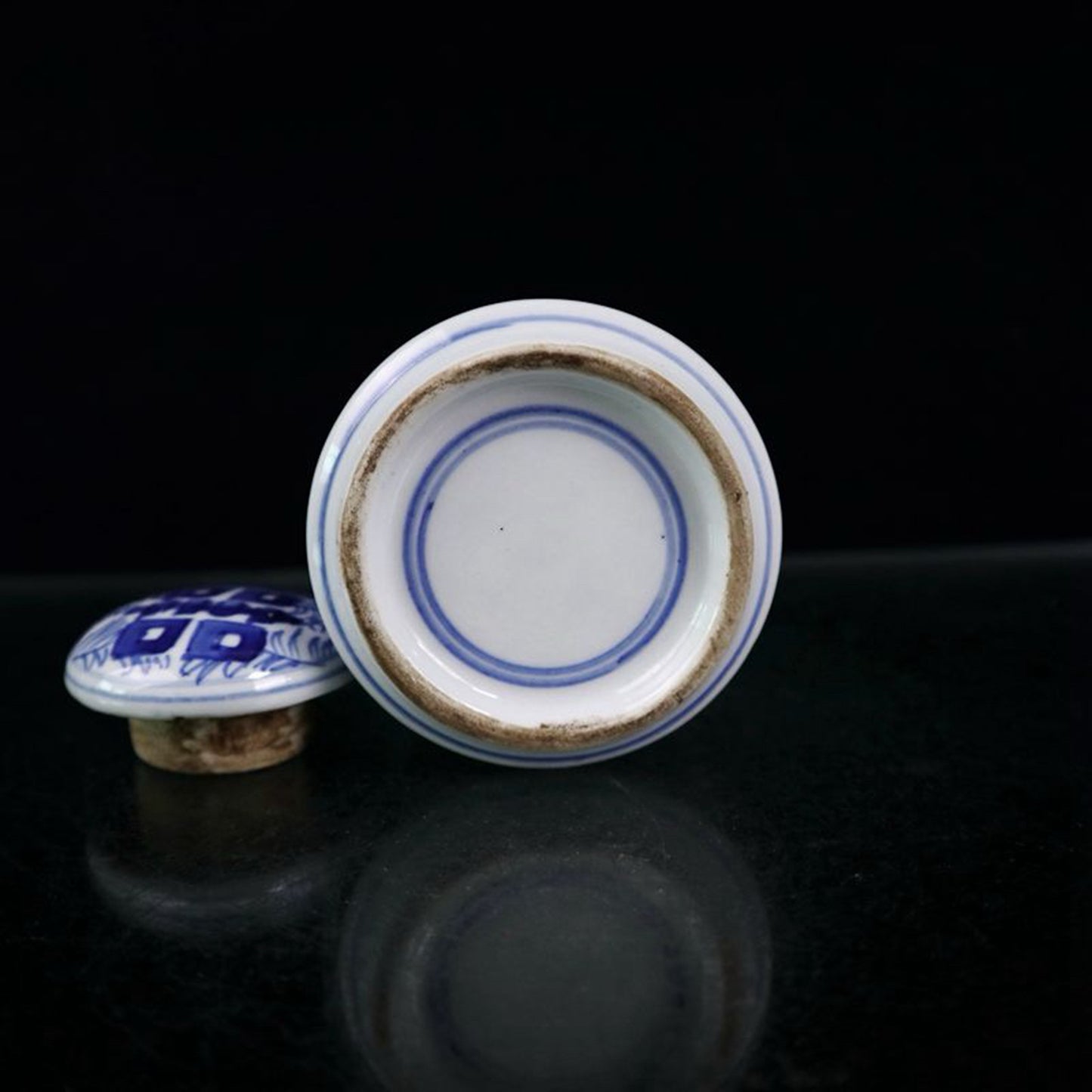 Blue and white double happiness entangled branch lotus pattern covered jar