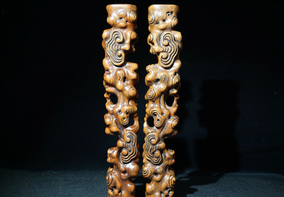 A pair of rosewood carved Ruyi weighing scales