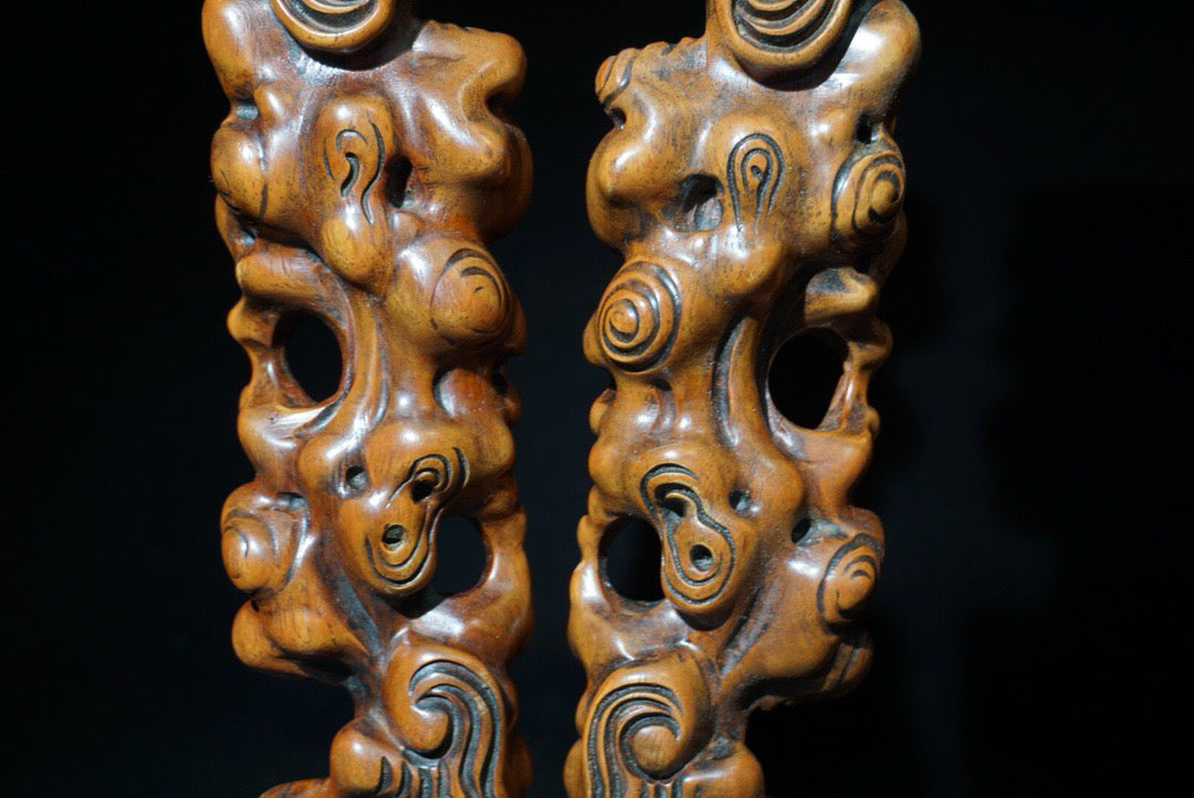 A pair of rosewood carved Ruyi weighing scales