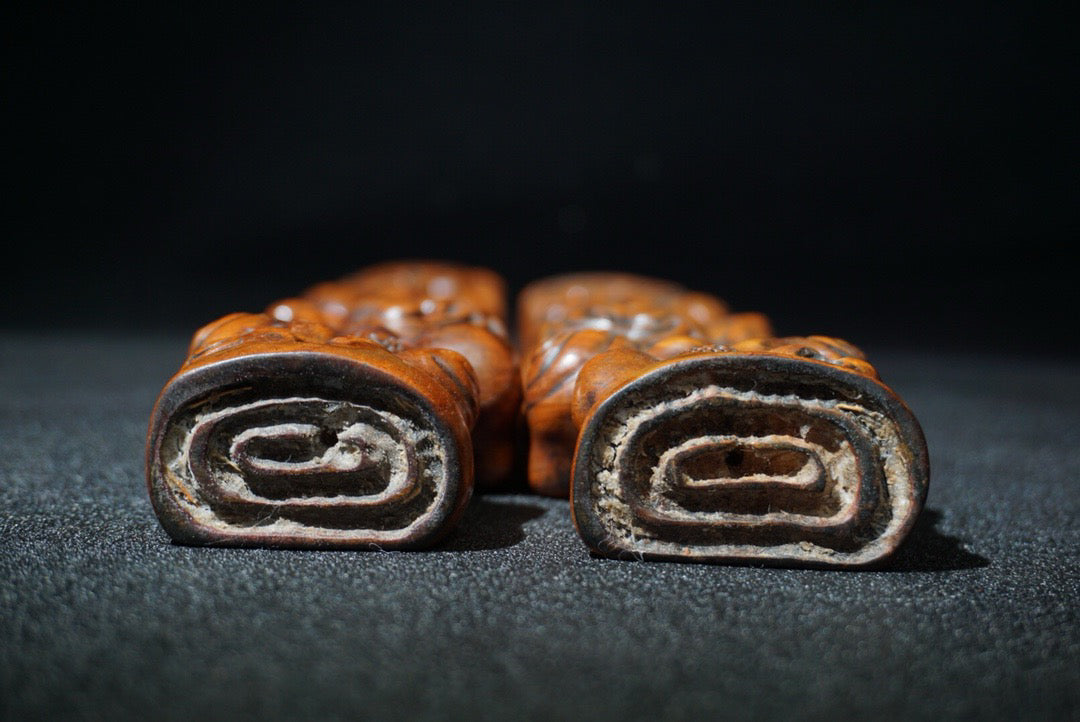A pair of rosewood carved Ruyi weighing scales