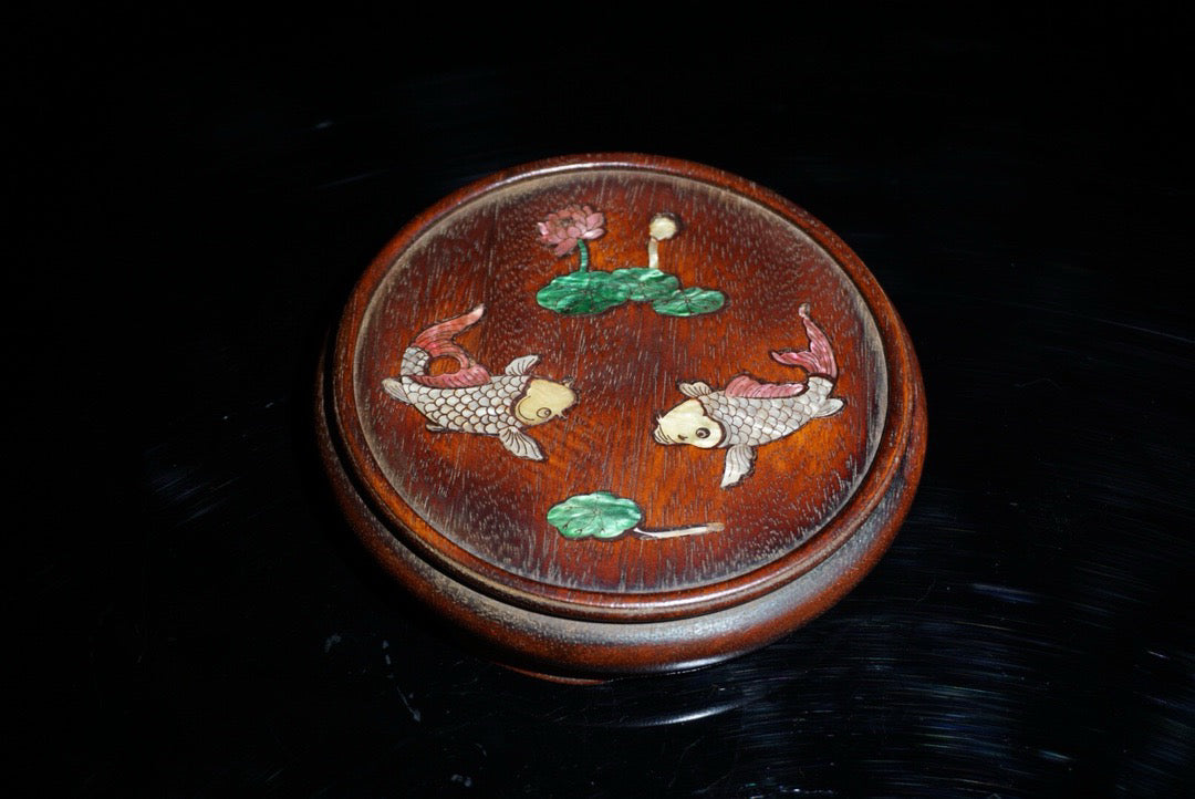 A pair of rosewood inlaid shells with a surplus base for years