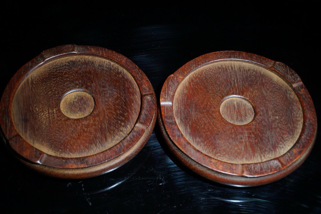 A pair of rosewood inlaid shells with a surplus base for years
