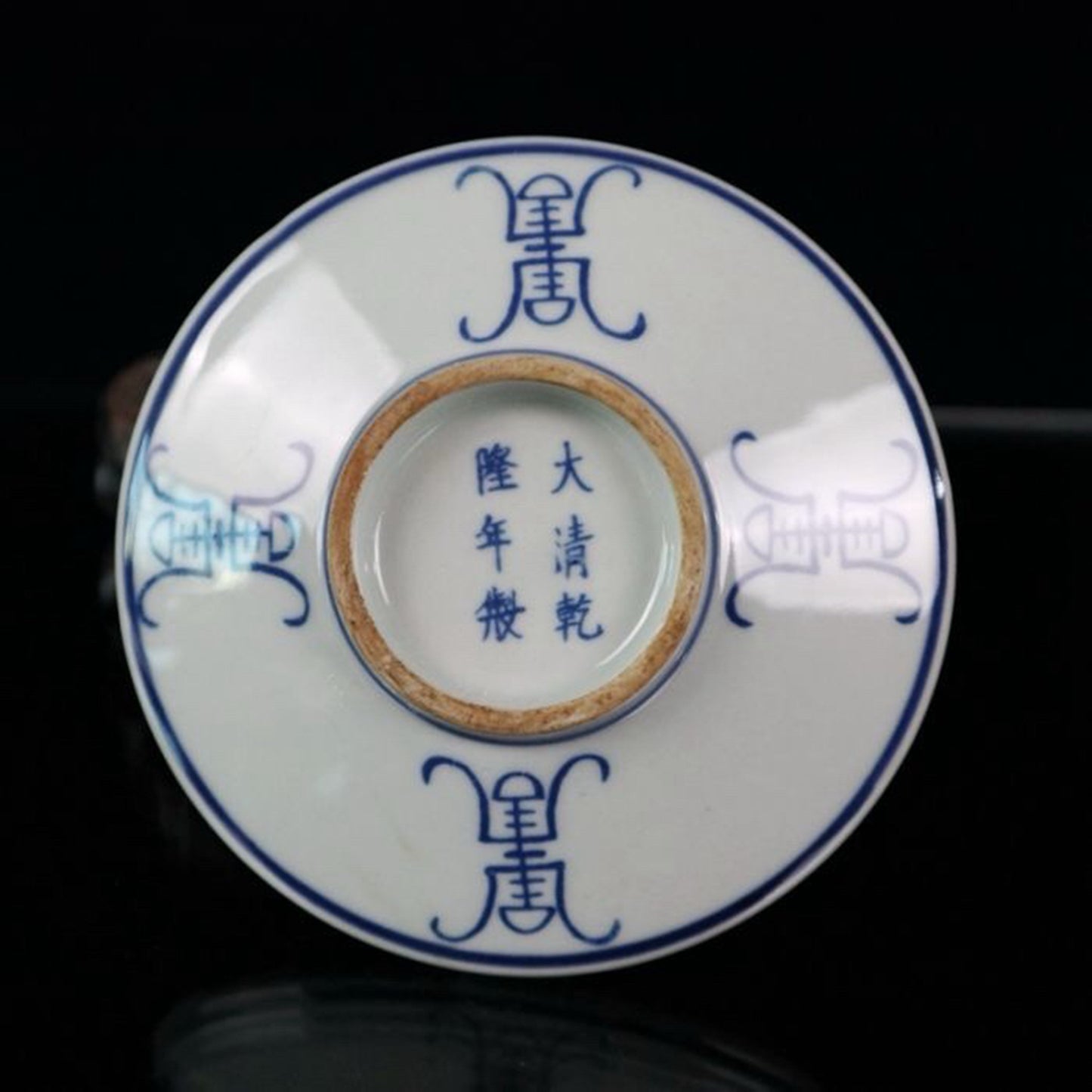 Ceramic blue and white glazed candlestick