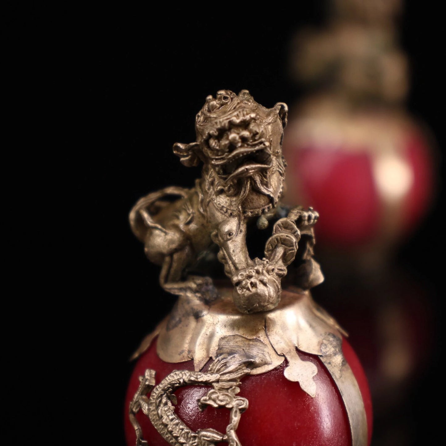 Collection of Chinese antique hand-carved Tibetan silver inlaid jade lion ball