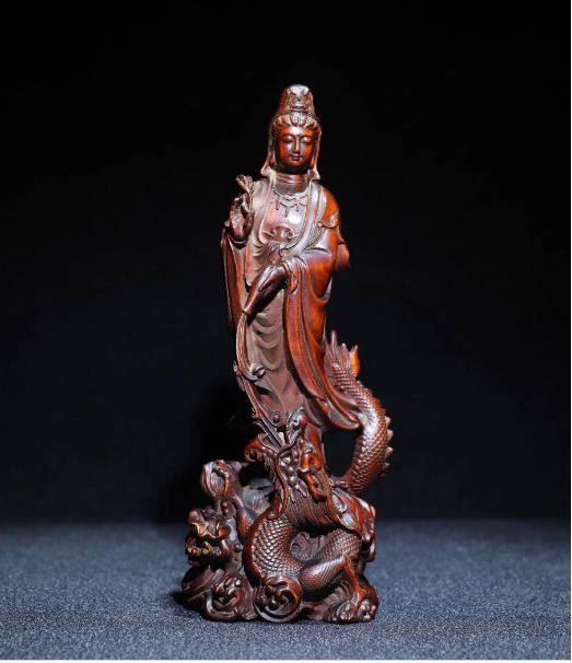Collection of antique Chinese boxwood dragon Guanyin statues
