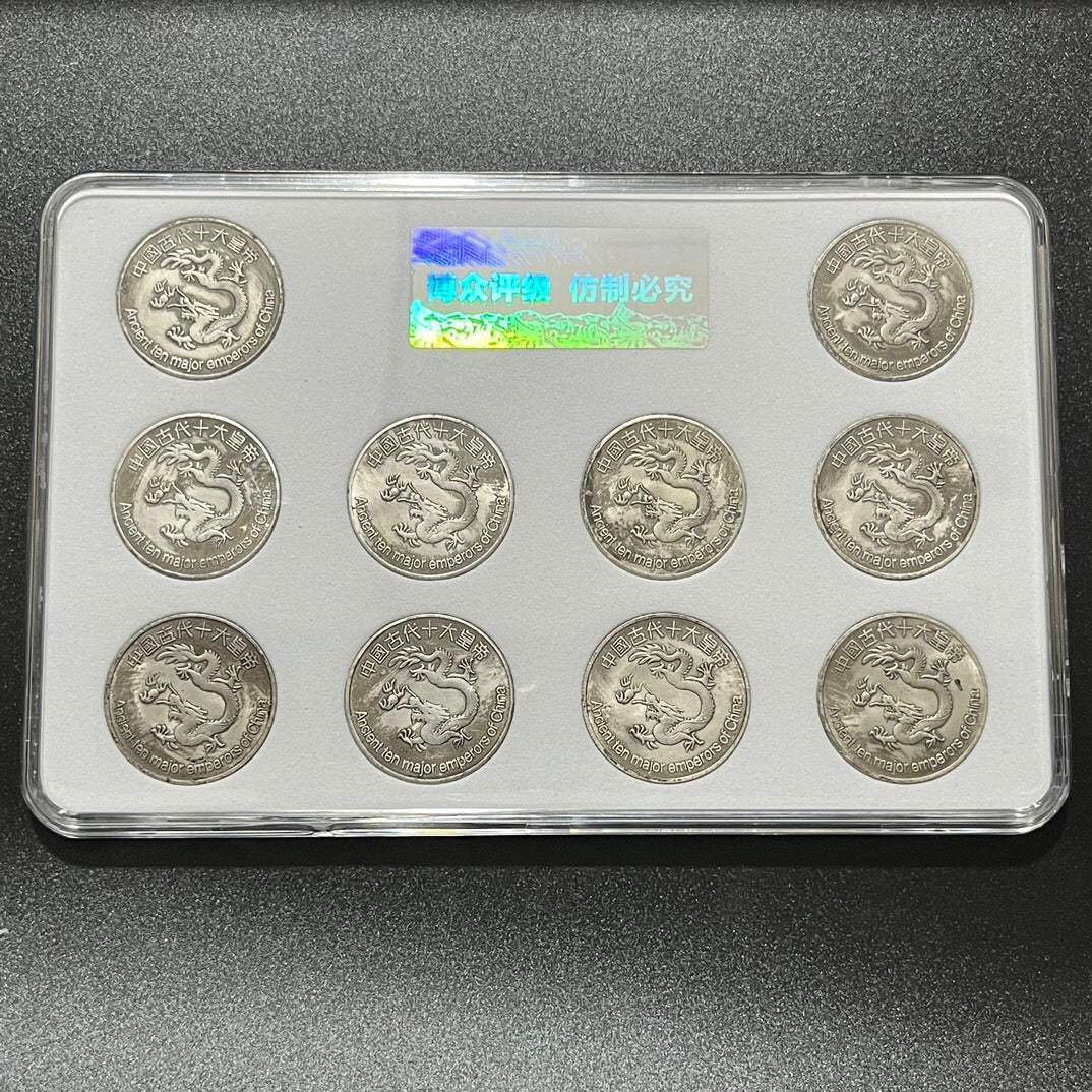 A set of Chinese antique ten hole silver coins