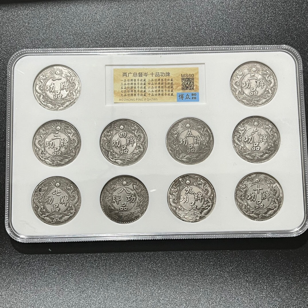 A set of Chinese antique ten hole silver coins