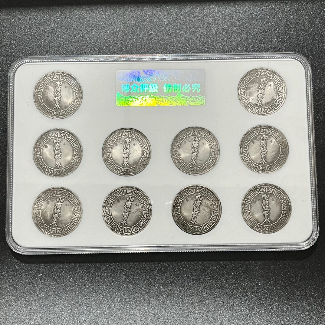 A set of Chinese antique ten hole silver coins