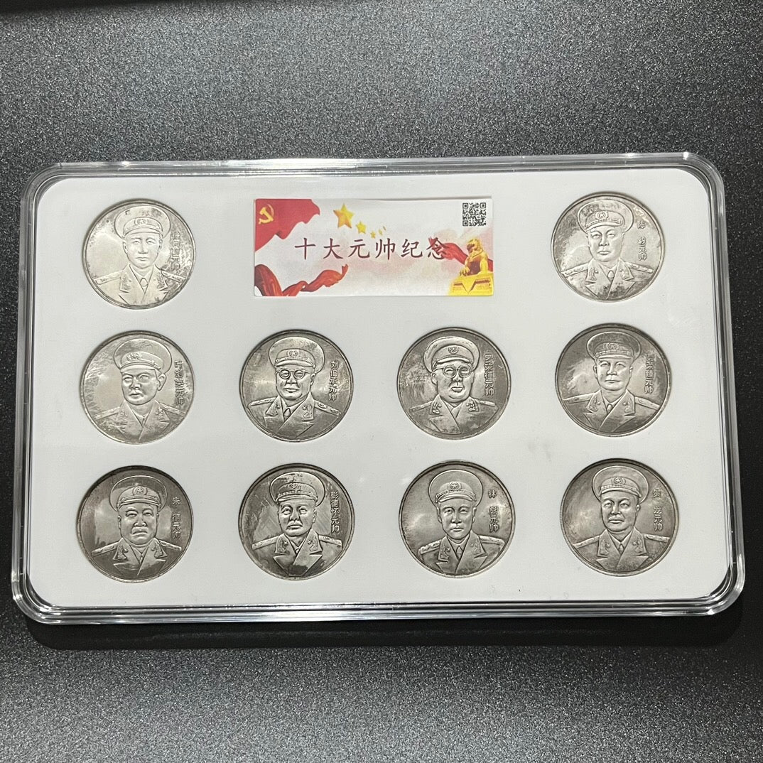 A set of Chinese antique ten hole silver coins