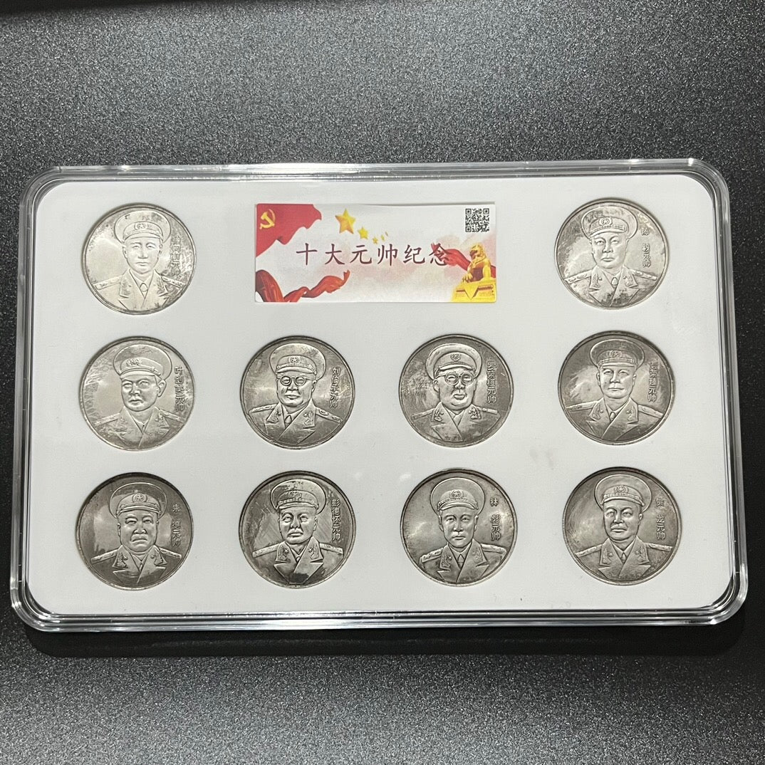 A set of Chinese antique ten hole silver coins