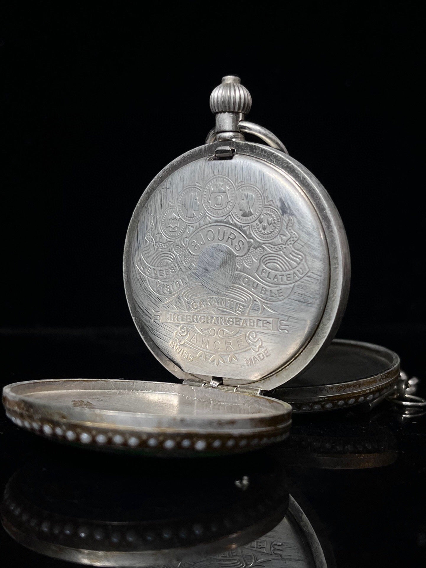 Chinese antique double opening pocket watch with sun, moon, and stars
