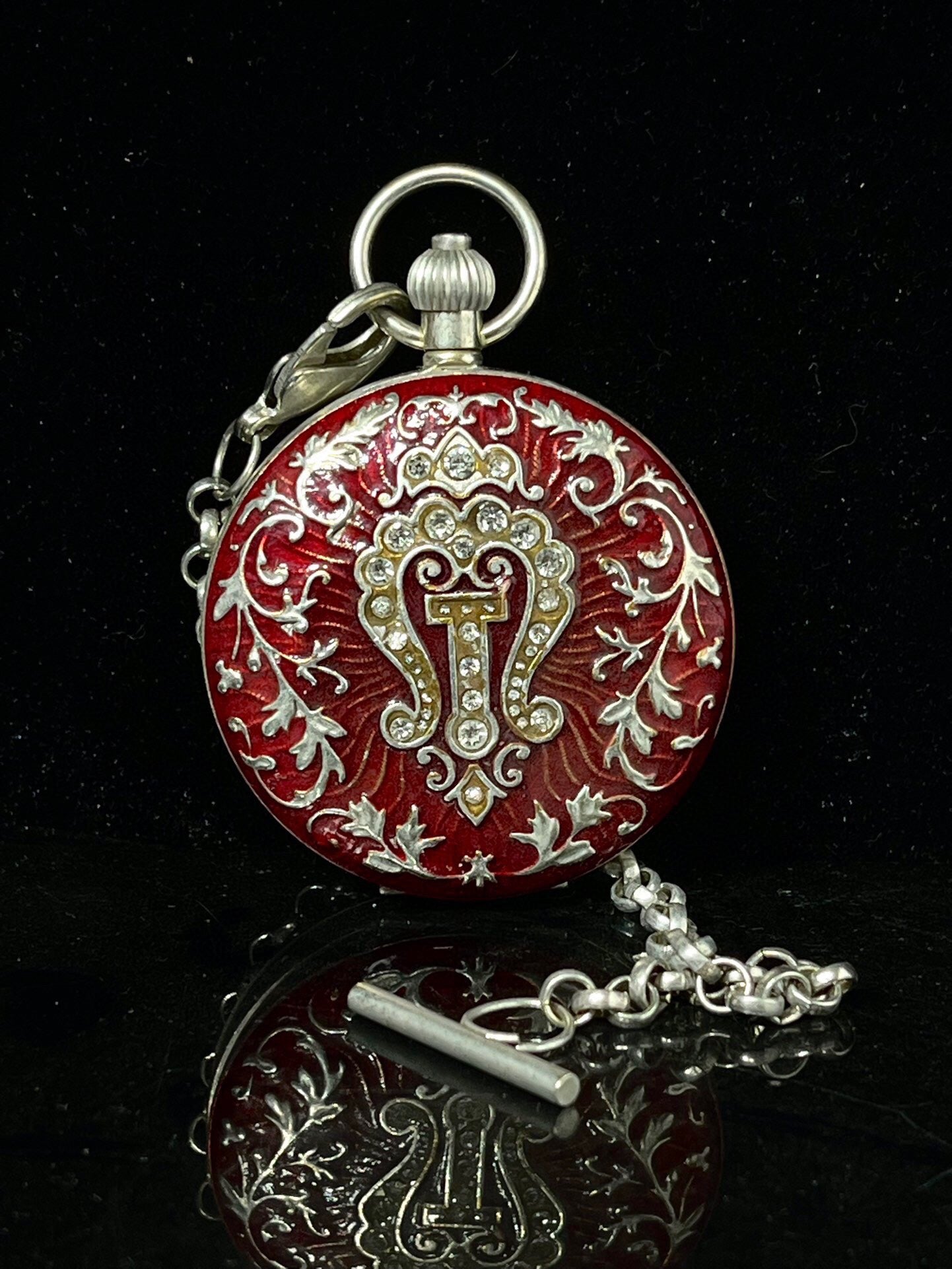 Chinese antique double opening pocket watch with sun, moon, and stars