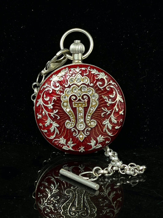 Chinese antique double opening pocket watch with sun, moon, and stars