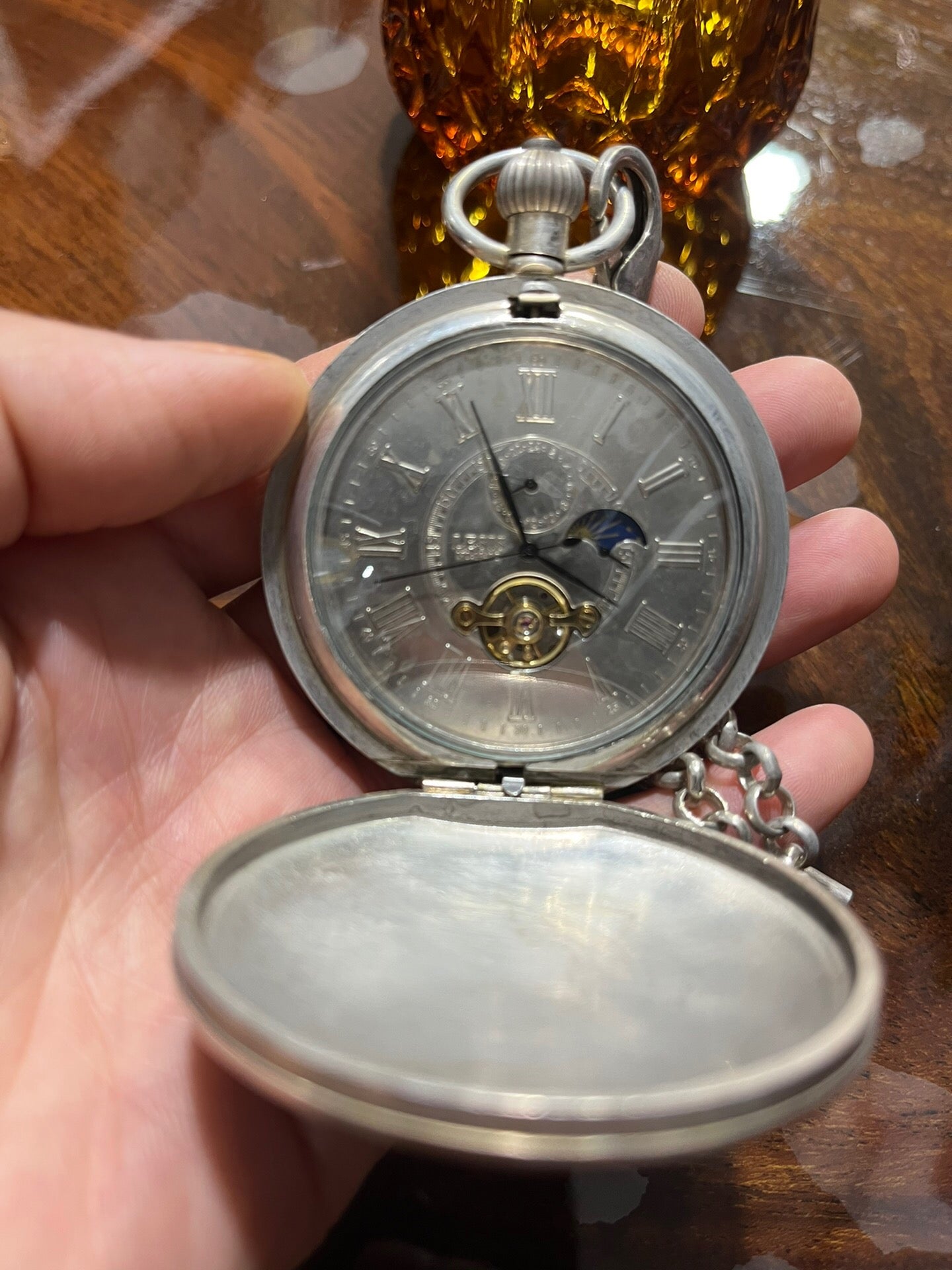Chinese antique double opening pocket watch with sun, moon, and stars