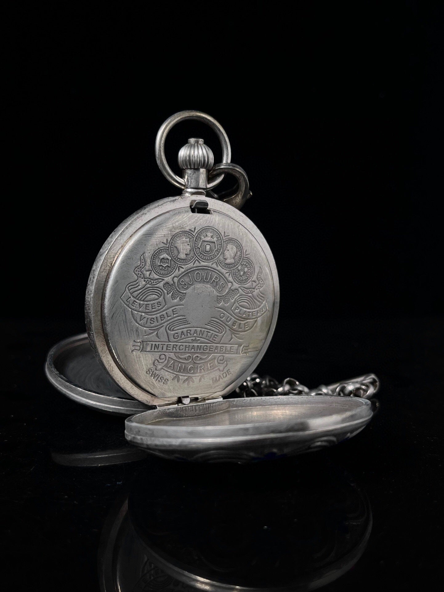 Chinese antique double opening pocket watch with sun, moon, and stars